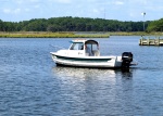 Shallow water cruiser.
Three feet max here when the tide is up, until you get out into the bay where it is four feet,maybe five.An adventure when the wind blows.
Jefferson Creek, Bethany Beach, DE.