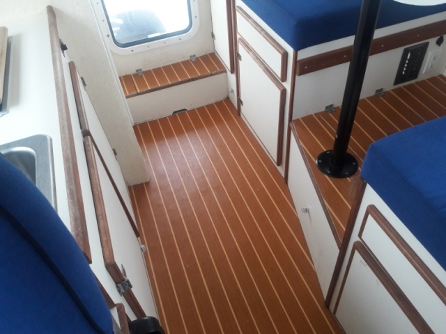 Lonseal teak/holly floor.