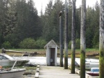 One holer open to the water on the Angoon docks with Eagle above.