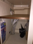 Aft cabinet with custom shelf and spare prop