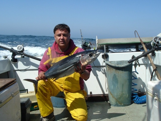 First fish in the box...see the clean deck?