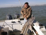 7-1/2 foot sturgeon...before being tossed back over the side