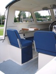 Port seat with cover for locker