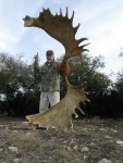 Gary with World Record Moose Horns, Taken at Wildman Lake Lodge, AK