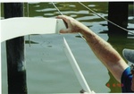 Back support is held in place with poles that go into the rod holders.