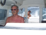 Pap at the helm...first mate (Nancy) in background