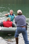 Jim lends a helping hand to Denny and Signe landing their dingy.