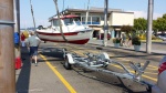 082414 Edmonds - Putting the c-dory back on the trailer.
