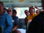 The bus is bouncing so hard that it's real easy to get a blurry photo! Can see Dan, Tanya, Roger and Ken!