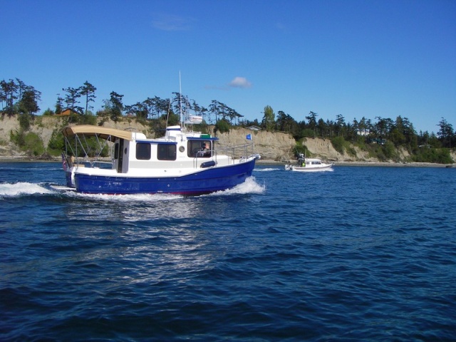 Ranger tug and C-Dory headed into Fishermans Bay, Lopez Island.