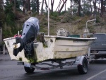 An early (late 70's ??) center console model C-Dory.  Still a working boat, Native Crabber out of Hansville.  (See NO Kicker)