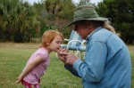 Kissing her first fish