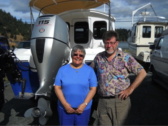 My wife Betty and Les Lampman on the day we picked up our boat.  Sadly, this was the last time we saw him with his beard;  he shaved it off two weeks later on our return