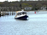 The Betty Ann arriving at its new home in Connecticut at Port Niantic. What great lines!  Note: If the port window looks kind of odd, it's because it is a piece of plexiglass taped to the hull with white shrinkwrap tape.  While Les was trailering our boat cross country, a passing vehicle threw up a stone, which crashed through 3/8