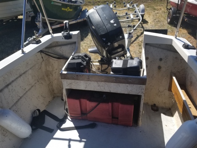 A little sad when I first found it but shes all spruced up now, see the repower photos. (This old 2 stroke still ran perfect) fished it just like this for a year :) 