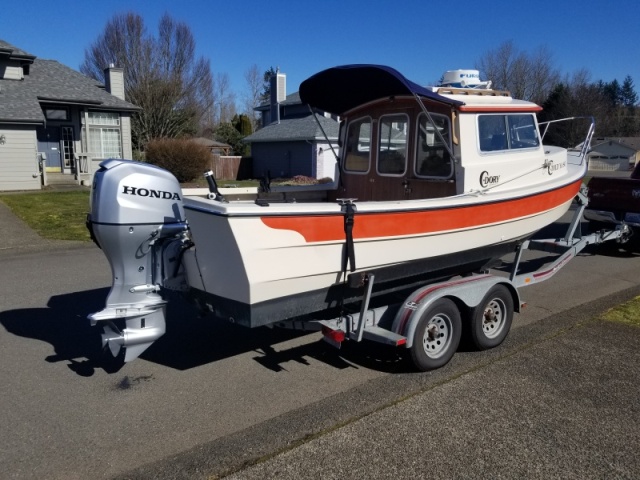 Here she is with a brand new Honda 90hp 