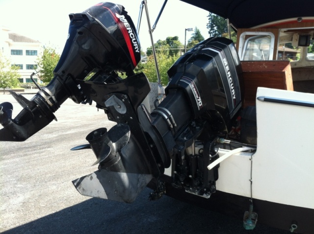 70 HP Mercury w/ 9.9 Merc kicker.