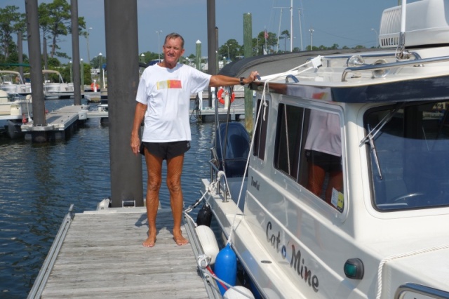 Our wet slip at NAS Pensacola.  Always broadside to the south wind, so pivot against the next wood piling and aim for my fenders attached to the dock.  Wish we could get a midship cleat on this side!