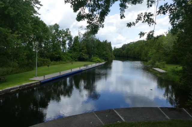 typical Rideau canal entrance canal to lock...shut down one engine if you have two so you don't lose 2 props if you hit a granite boulder. 
