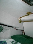 (Lynn Marie)Carpet on cabin roof, side, deck, & hull @ starboard by electrical panel cover. 