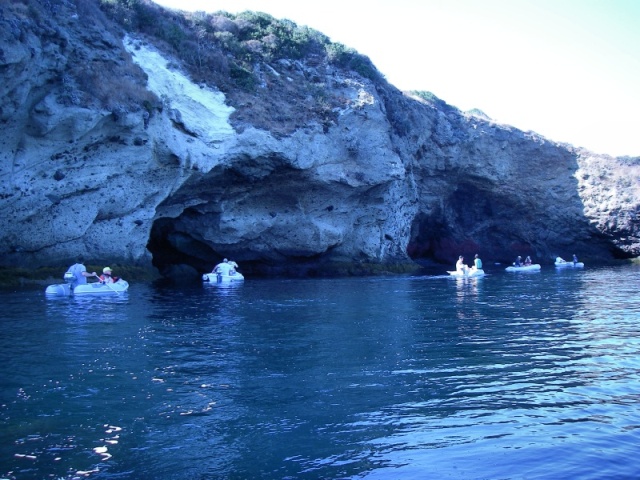 Exploring Caves.  Note oars for seaweed