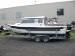 Our boat and trailer rode out on a fifth wheel flatbed trailer, no worse for wear