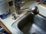 new pull-out faucet and soap dispenser for less wasted water and puddles on the counter