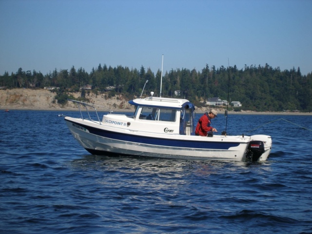 Jeff Head salmon fishing.  Photo courtesy of C-Fisher.