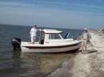 We took a Sunday cruise on Lake Pontchartrain and stopped for a while on this beach. Since the fish weren't biting, due to the spillway opening, we picked blackberries instead.