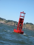 The infamous Buoy 10, and Cape Disappointment Lighthouse beyond