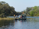 Airboat with guys Bow Hunting on it for fish ! Cool..