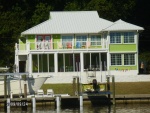Happiest House I've ever seen, check out the matching boat on the lift. :-}