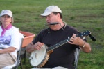 Tom McHugh on the banjo and harmonica 