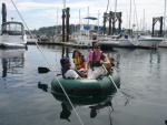 TWO LUCKY FISH crew 
trying out an Alaska
Series dinghy