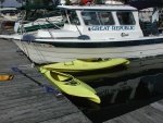 Great Republic and kayaks at Burton Island dock. Kayaks travel in cockpit.