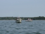 Twin 26' ProAnglers out trolling on July 4th, 2009