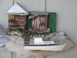 6/29/2012  A carved model of my old 22' CD.
Carved in Beaufort, SC. My brother sent it for my birthday several yrs. ago.
Boat is about 14