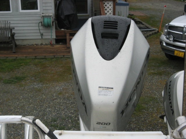 7/22/12 Painted cowling to repair the peeling gray paint.  Used black 