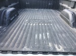 Mat between truckcamper & truck bed for bed & camper protection & to keep camper from moving in bed with normal tie downs