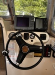 Trim Tab Switches Under B&W GPS, FWD Circuit Breaker Switches and Fuses, Boat Tilt Fuel Level and Engine Gauge on Panel