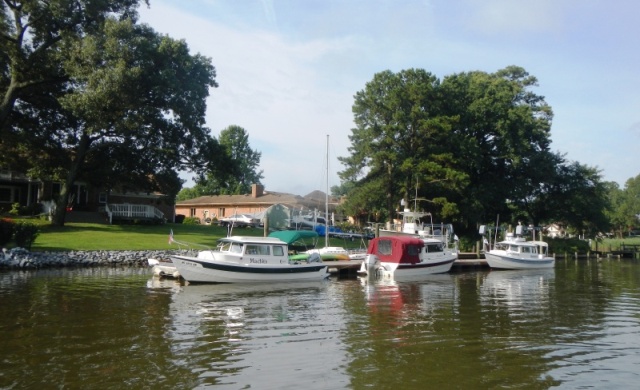 Boats leaving from the Baum's dock 2