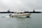 USS Stennis, USS Ronald Reagan, Jenny B with her pants down in San Diego Bay. Photo courtesy of the ever alert Byrdman.