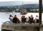 Cocktail hour(s) at the end of the pier at Newcastle Island, with Nanaimo in background.