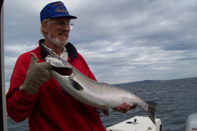 Dad with his 12.42 pound coho during Everett Coho Derby