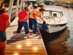 Laura cleans glass off the bow observed
by Debbie, Kellie and Ashley