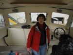 Dee checking out the inside of the almost done 25' C Dory. Is it really ours? 4/16/05