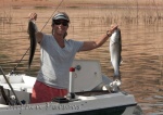 Donna with a couple of nice striped bass.