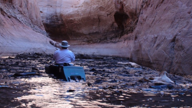 Jody in flood debris near head of Secret Canyon. Photo by Hunkydory Jay 