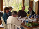 Valerie, Carol, Becky, Rick and Carol chowing down while discussing the next destination. 