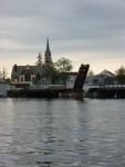 Railroad draw bridge and churh at tip of Paugus Bay. 